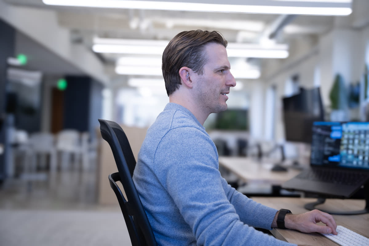 Teammate working at a desk