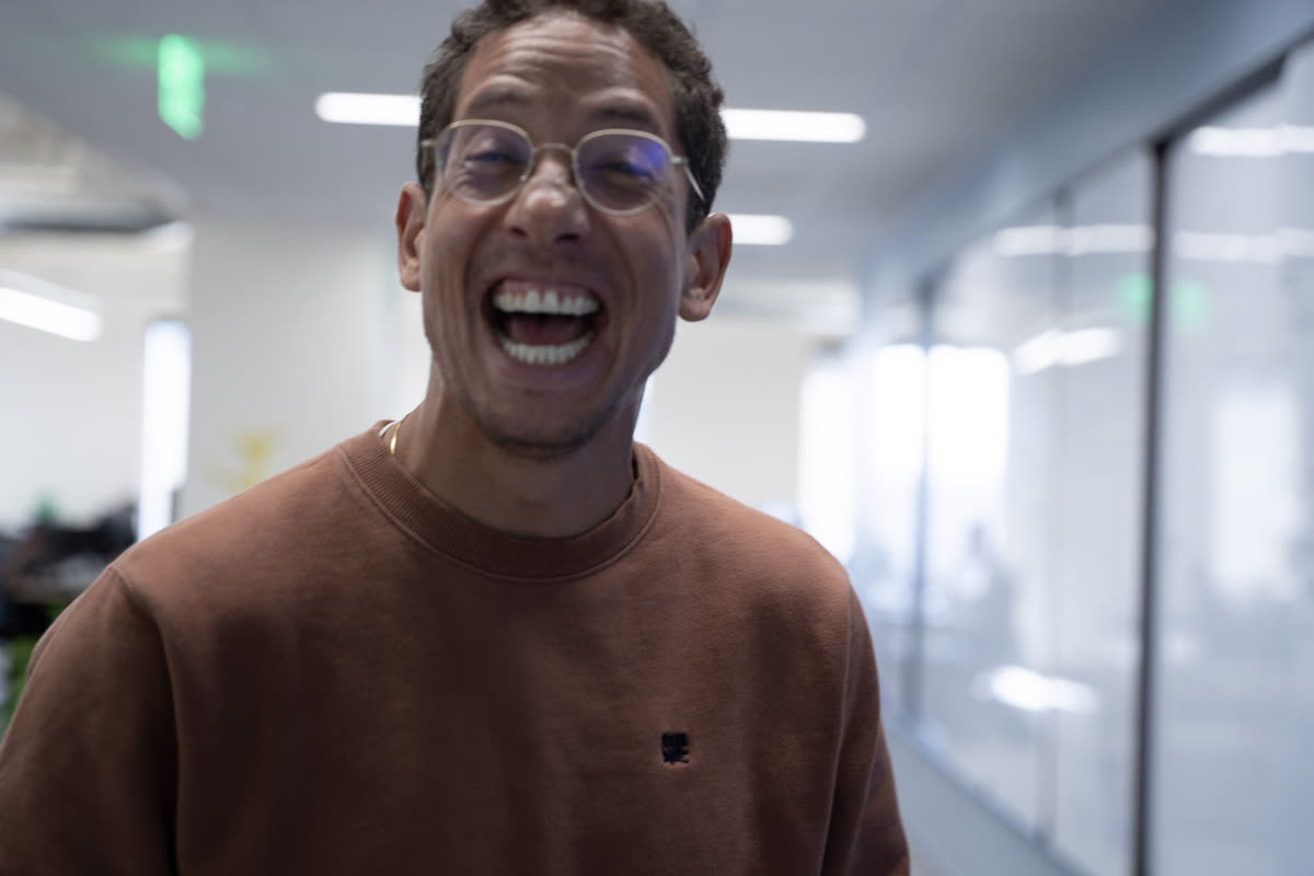 Teammate laughing in the office
